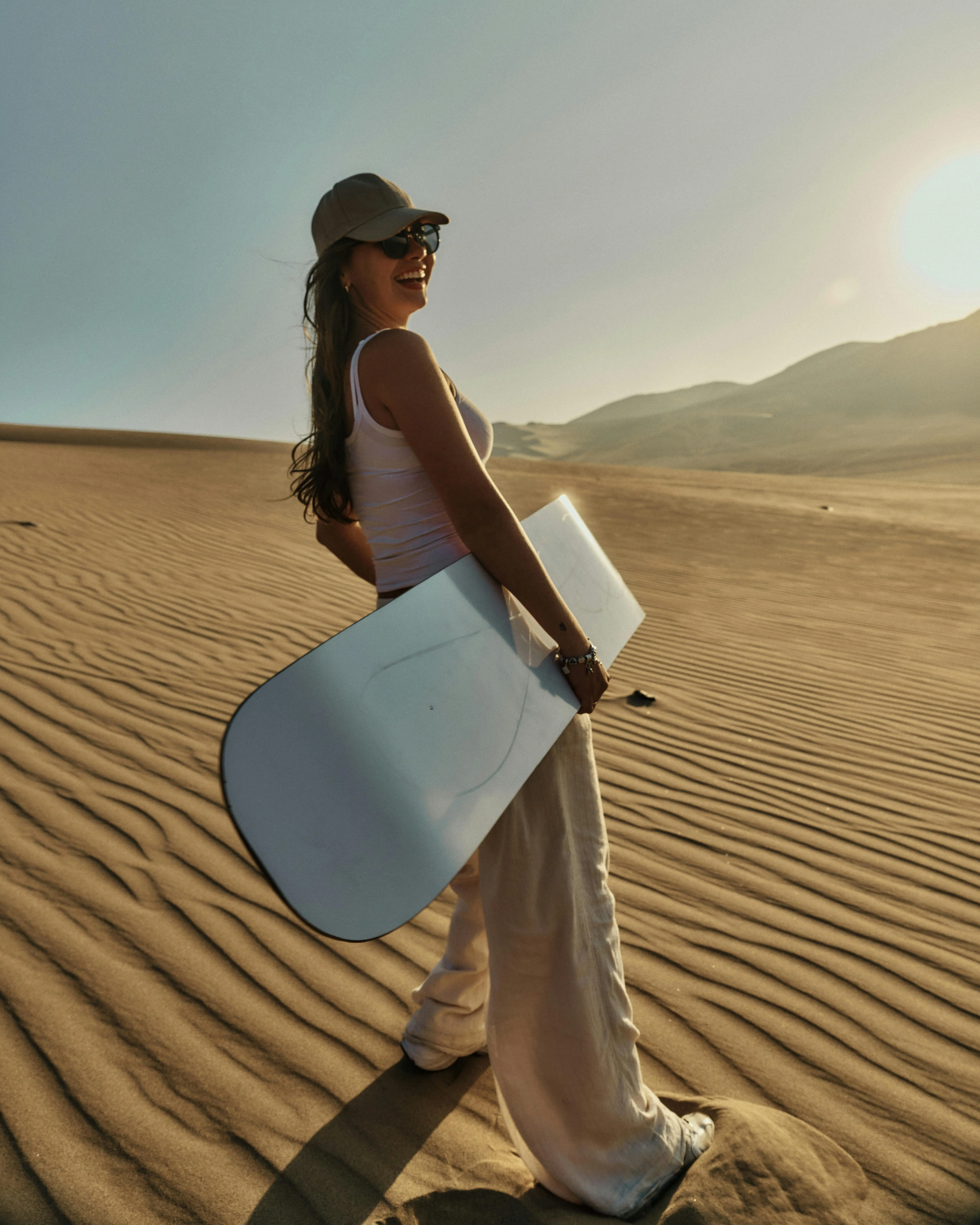 Sandboarder on Dune